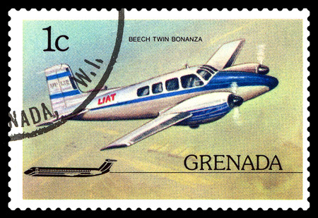 STAVROPOL, RUSSIA - October 10, 2016: a stamp printed in Grenada, shows  plane Beechcraft Twin Bonanza 1952,  circa 1976.のeditorial素材