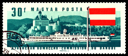 STAVROPOL, RUSSIA - November 7, 2016: A stamp printed in the Hungary shows Ship Deak Ferenc,  Shonbuchel Castle and flag Austria, series, circa 1967のeditorial素材
