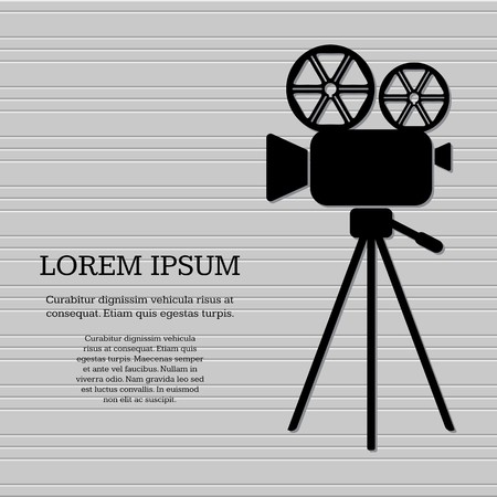 Black retro movie camera on grey backgroundのイラスト素材