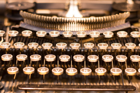 Detail of old typewriter keys in retro colorsの写真素材