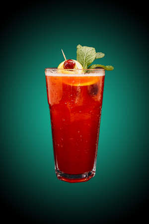 Strawberry lemonade isolated on green gradient. Refreshing drinkの写真素材
