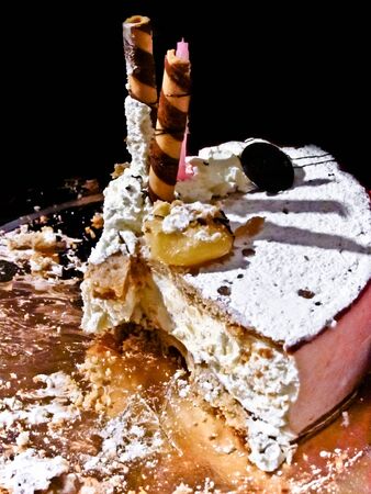 Delicious Cream Cheesecake, the last slice and scattered crumbs after eating.の写真素材