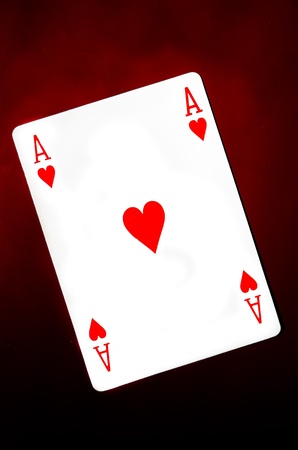 Ace of hearts on red background