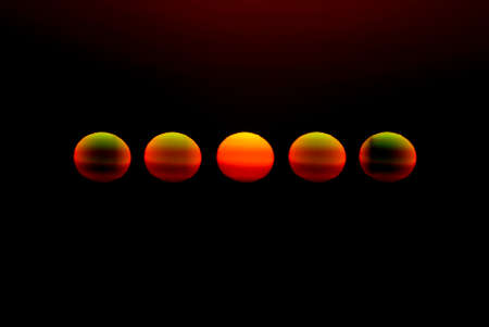 Five sun on line on black background