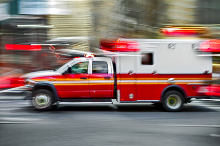 Ambulance on emergency call in motion blurの写真素材