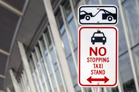 traffic sign prohibiting stopping and evacuation on tow truckの写真素材