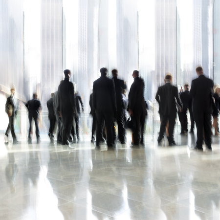 abstrakt image of people in the lobby of a modern business center with a blurred backgroundの写真素材
