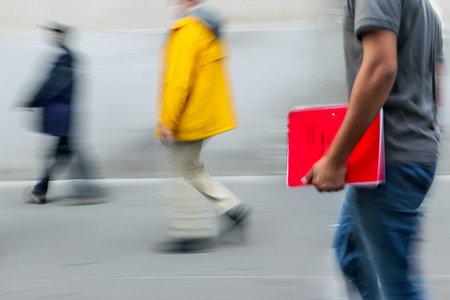 abstract image of business people in the street and modern style with a blurred backgroundの写真素材