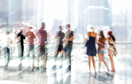 abstract image of people in the lobby of a modern business center with a blurred backgroundの写真素材