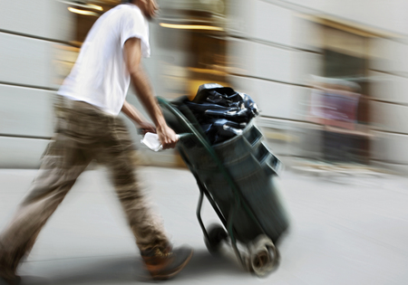 delivery goods with dolly by hand, purposely motion blurの写真素材