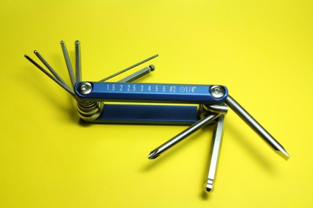 Multitool on a yellow backgroundの写真素材