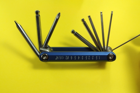 Multitool on a yellow backgroundの写真素材