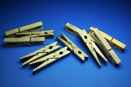 pegs on a blue backgroundの写真素材
