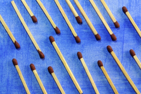 Matche displayed in a decorative way on a blue background
