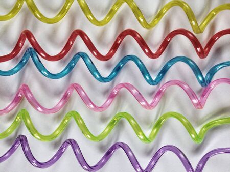 Close view of colorful straws curledの素材
