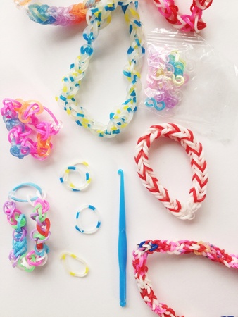 Close view of rubber bracelets and blue hookの素材