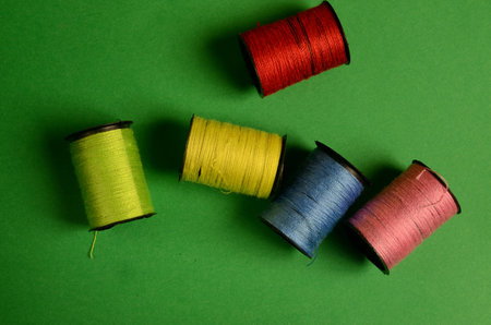 Close view of sewing rolls of cotton