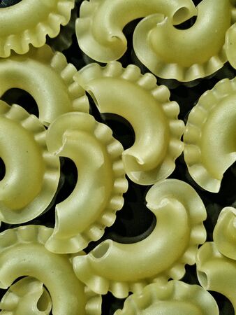 Close up view of pasta shapes forming patternの素材