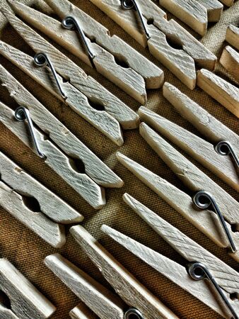 Close view of grouped wood pegsの素材