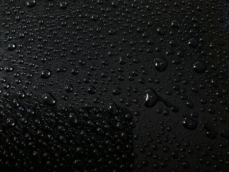Drops of water pattern on black backgroundの素材