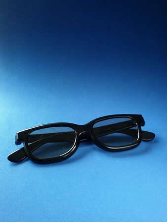 3rd isolated glasses in blue backgroundの素材