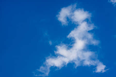 Fantastic soft white clouds against blue sky