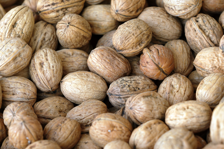 nuts in a cassette at the market of dried fruitsの写真素材