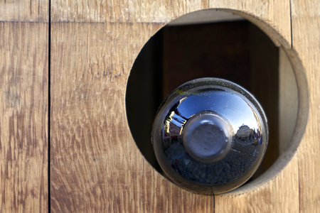 Bottle of red wine in wooden wine cellarの写真素材