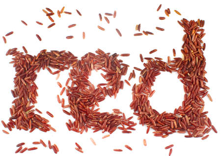 The word red spelled out in healthy organic red rice grains.