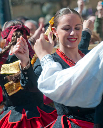 SEGOVIA  SPAIN - MARCH 16 2014 - Spanish folk dancers in the ancient Roman city of Segovia, Spain .  Dancing the Jota.のeditorial素材