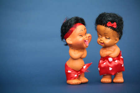 Cheerful plastic toy couple enjoying and laughingの写真素材
