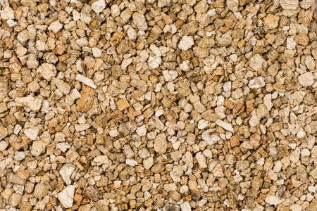 background and strukture in gold with material like chunk of wood