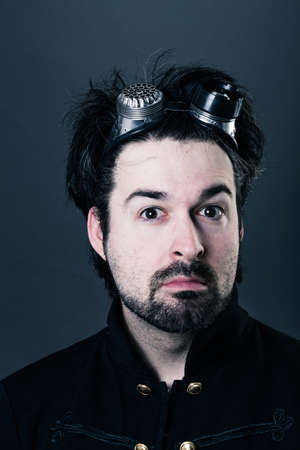 one in steampunk outfit with gogges upの写真素材