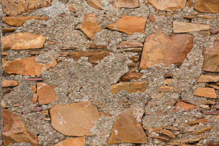 picture of a wall in grunge style with sand stone