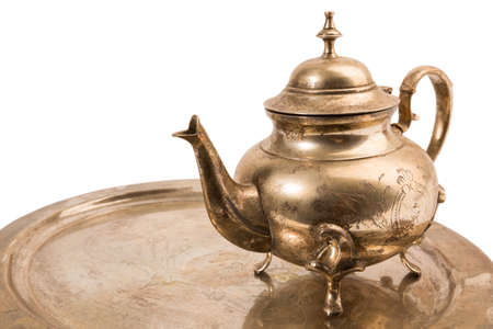 metal teapot in bronze for coffee and teaの写真素材