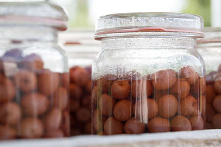 fruit canning jars in the kitchenの写真素材