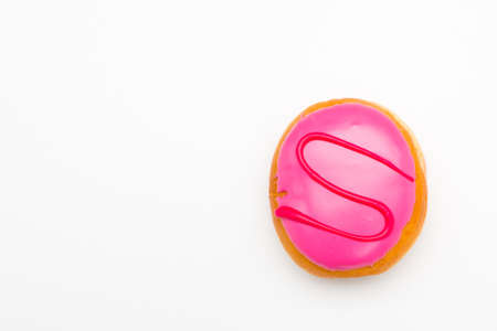 a rose pastry piece with colorful sweet icing