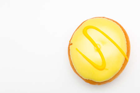 a pastry pieces with colorful sweet icing and a chick