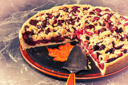 cutout, detail of a plum cake, in vintage styleの写真素材