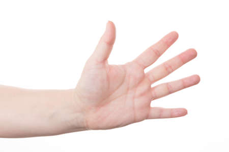female hands show five fingers against white background