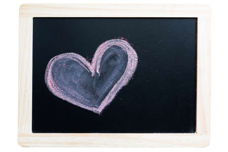 painting of a heart with chalk on a blackboardの写真素材