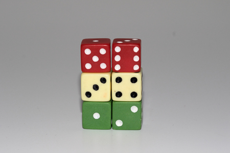 three color pair of cubes in line and full view and front view photographed in close up, macro and...