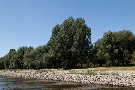 Landscape at the rhine riverbank in cologne Germany photographed during a sightseeing boat trip on...