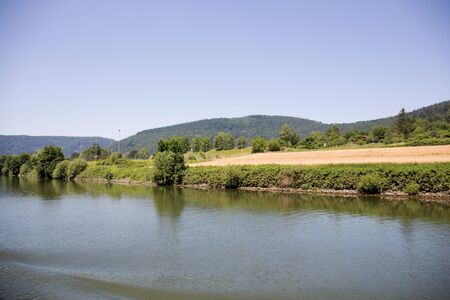Distant view on the landscape at the neckar in heidelberg germanyの写真素材