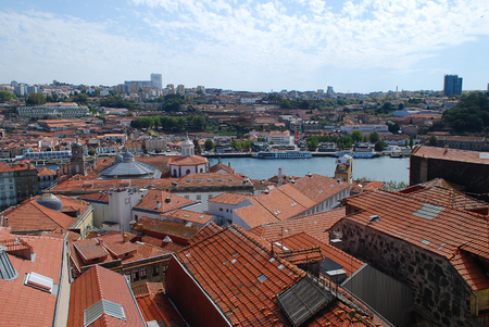 Colored facades and roofs of houses in Porto and the river Douro, Portugal. Porto is the second-largest city in Portugal after Lisbonの写真素材