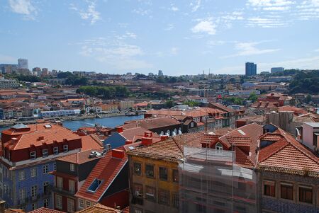 Colored facades and roofs of houses in Porto and the river Douro, Portugal. Porto is the second-largest city in Portugal after Lisbonのeditorial素材