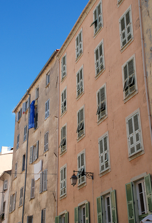 Typical Corsican house facade in Ajaccio town (Corsica island, France), a French commune in the Haute-Corse department of France located in the north-east of the island of Corsica at the base of Cap Corseの写真素材