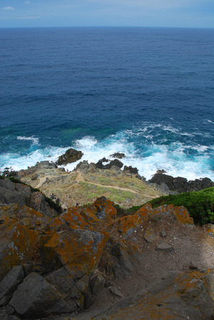 Coastal scene, blue sea of white foam nearby the Pointe de la Parata, Ajaccio, Corsica, Franceの写真素材