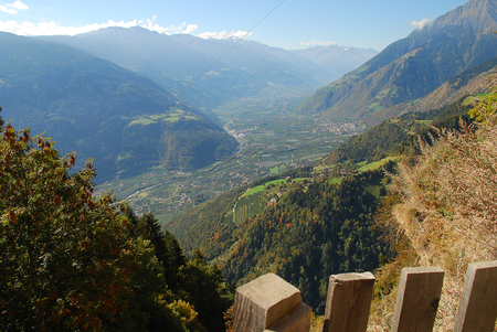 Panorama view on valleys and mountains (Texel Group) in the italian alps standing at the cableway station Hochmuth (Meran, South Tyrol, Italy)の写真素材