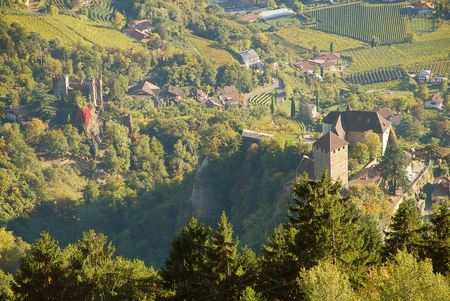 Aerial view of Tyrol Castle and Brunnenburg castle in Tirolo, South Tyrol, Italy. Tyrol Castle is home to the South Tyrolean Museum of Culture and Provincial Historyのeditorial素材